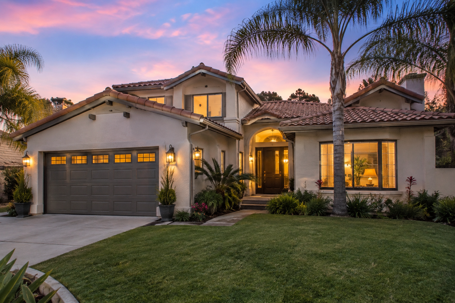 A Southern California home at dusk, illustrative